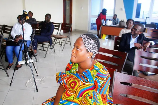 Participants listening closely during a training session