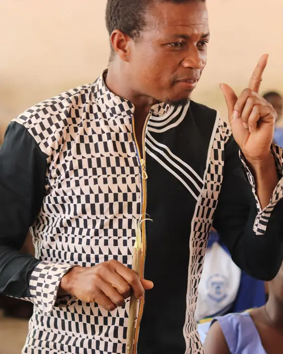 A teacher leading a lively lesson in a classroom